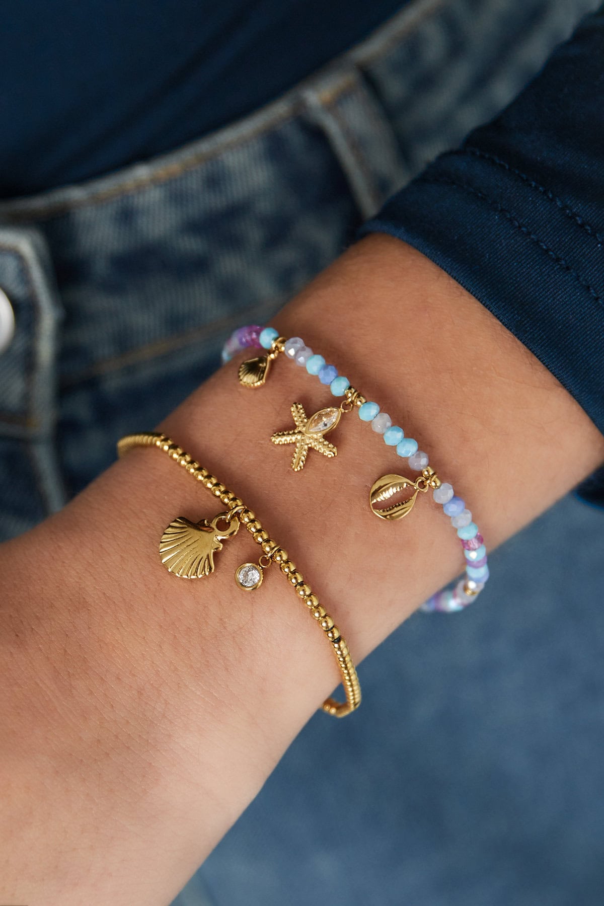 Armband Sparkly Shell Goud om pols