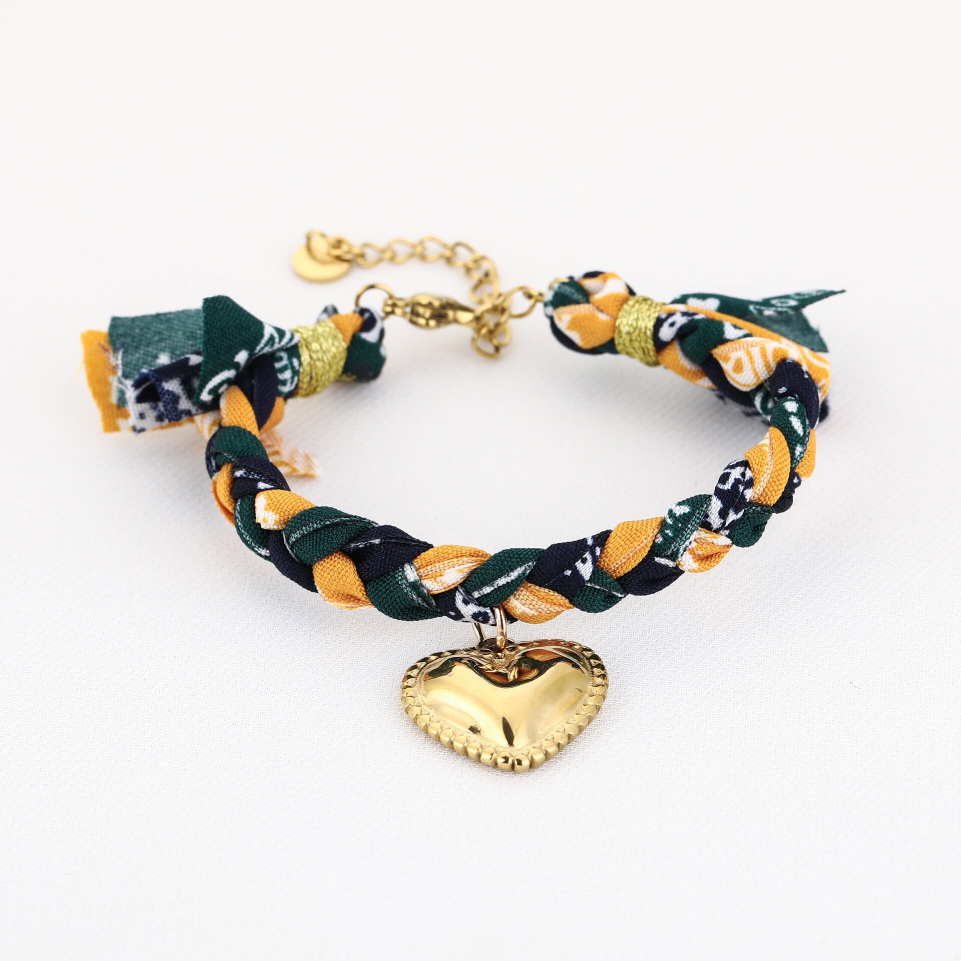 Armband gevlochten met hartje bedel Gold