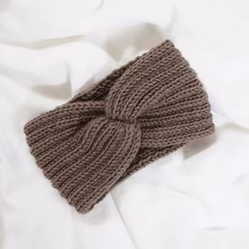 Gebreide winterhaarband met knoop in diverse kleuren