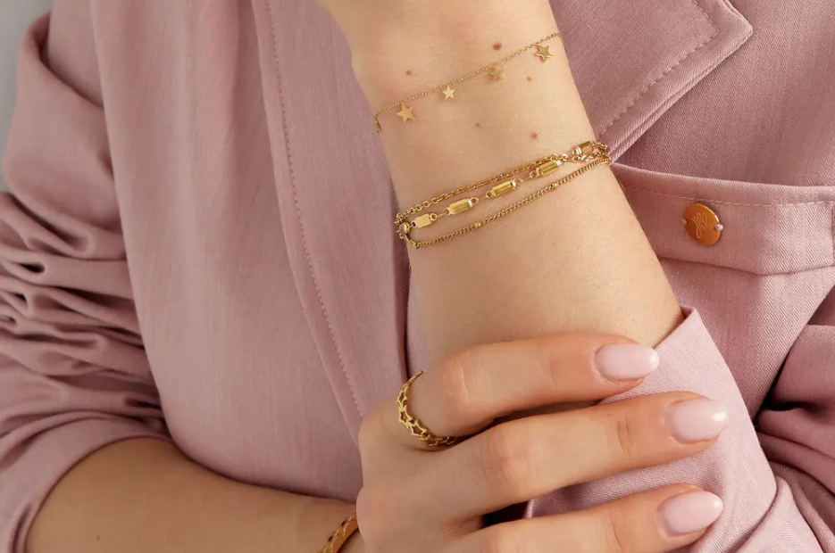 Banner Openingssale 2 gouden armbandjes