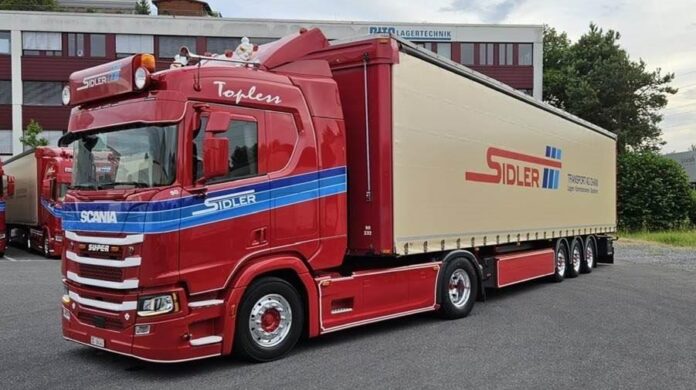 SCANIA  NEXT GEN R SERIE MET SCHUIFZEILEN OPLEGGER  SIDLER