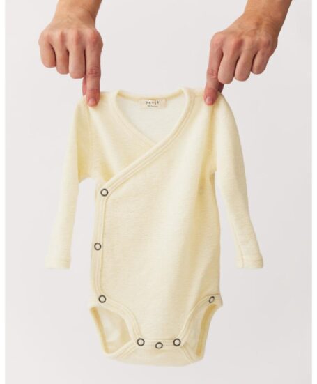 Petit by Basics overslagromper off-white merinowol wol merino warmteregulerend zelfreinigend duurzame babykleding winterkleding unisex